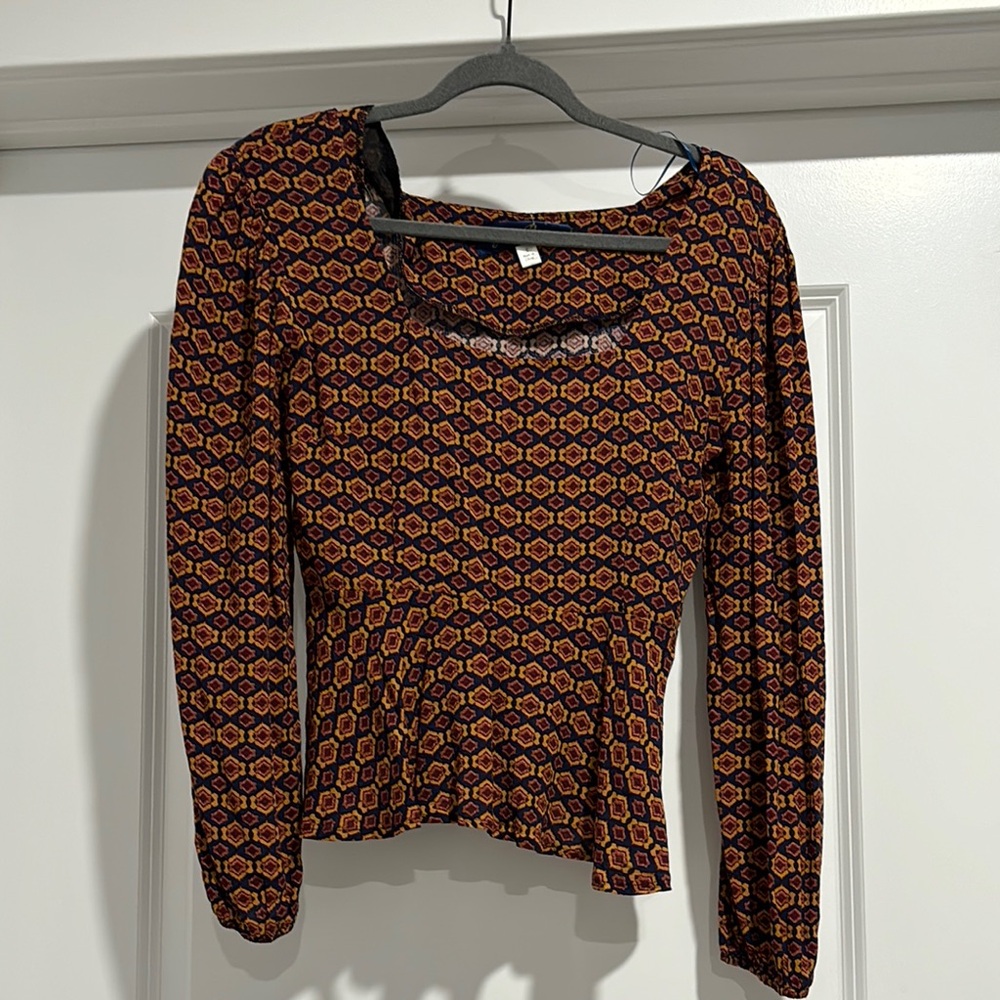 Navy base multi colored patterned Peplum Blouse with Long Sleeves